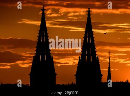 Prague, Czech Republic. 29th Apr, 2020. A silhouette of Basilica of St. Peter and St. Paul, church in Vysehrad fortress in Prague, against the Sunset, Czech Republic, on Wednesday, April 29, 2020. /CTK Photo/Roman Vondrous) Stock Photo