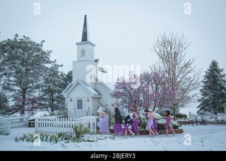 Snowy wedding day chapel,gazebo and cottage Stock Photo