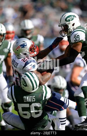 October 20, 2013: New England Patriots running back Stevan Ridley (22) carries the ball and is tackled by New York Jets inside linebacker DeMario Davi Stock Photo