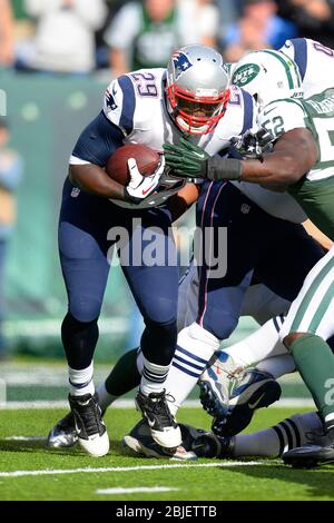 October 20, 2013: New England Patriots running back LeGarrette Blount (29) carries the ball as New York Jets inside linebacker David Harris (52) defen Stock Photo