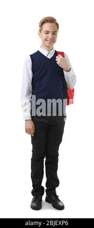 Teenage boy in school uniform with backpack on white background Stock Photo