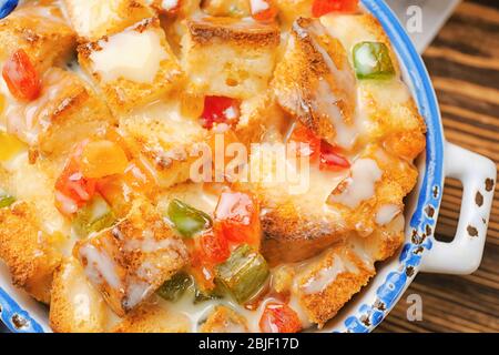 Freshly baked bread pudding in casserole dish, closeup Stock Photo