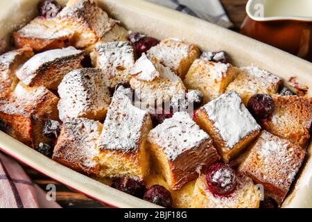 Freshly baked bread pudding in casserole dish, closeup Stock Photo