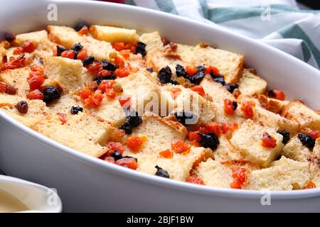 Freshly baked bread pudding in casserole dish, closeup Stock Photo