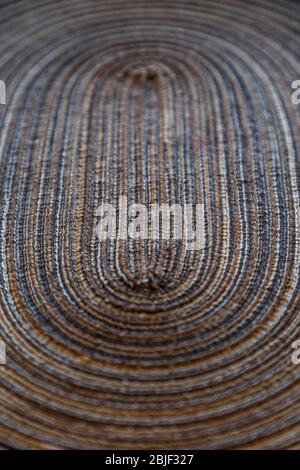 Close-up of a brown and light gray tablet mat or placemat, viewed from the front. Stock Photo