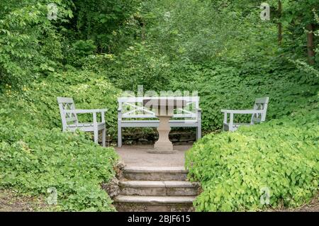 Benches and table in the park at Goethe's garden house in Weimar