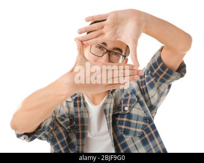 Young Asian man posing on white background Stock Photo