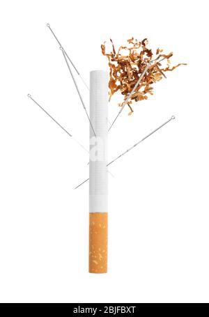 tobacco needles Cigarettes with needles and tobacco on white background Stock Photo