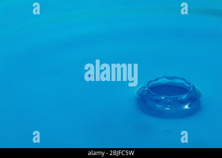 water drop photography, blue water, close up macro Stock Photo
