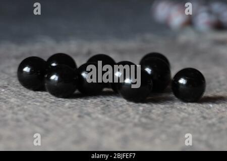 Black balls of marble Stock Photo