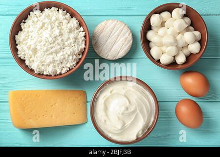 Different dairy products on wooden table Stock Photo