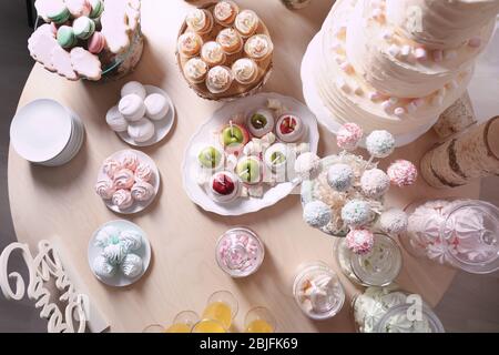 Tasty sweets on table prepared for party Stock Photo