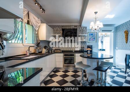 Beautiful Marble Kitchen Counter and Stove With Cobalt Blue Decor