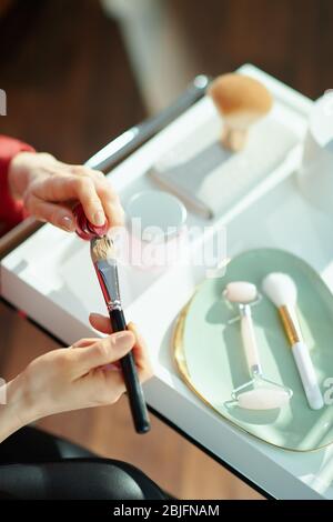 Cosmetic glow, makeup brush on face and black woman with skincare in  studio, cosmetics tool. Skin care, blush and foundation, African beauty  model Stock Photo - Alamy