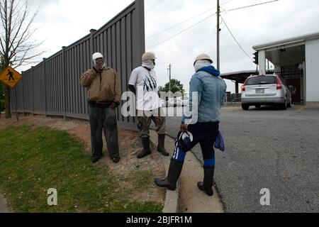 https://l450v.alamy.com/450v/2bjfr1m/marietta-ga-usa-29th-apr-2020-employees-of-the-tip-top-poultry-processing-facility-take-a-break-from-their-jobs-hanging-chicken-the-company-was-thought-to-be-responsible-for-listeria-contaminated-chicken-which-resulted-in-multiple-product-recalls-in-the-us-and-canada-in-2019-credit-robin-raynezuma-wirealamy-live-news-2bjfr1m.jpg