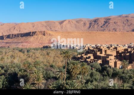 Tinghir Morocco Skyline with Mud Homes and Palm Trees Stock Photo