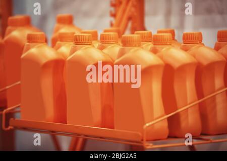 Car and motorbike engine oils on exhibition in showroom Stock Photo