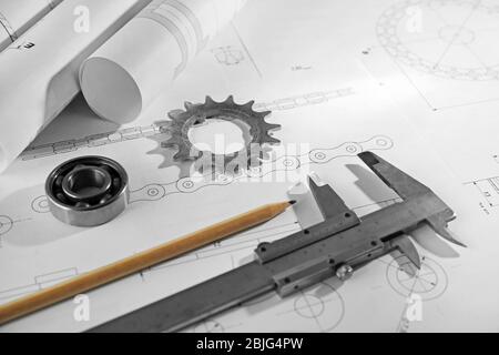 Engineering supplies and blueprints on workplace Stock Photo