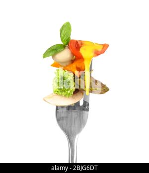 Fork with pinned snack and cheese sauce on white background Stock Photo