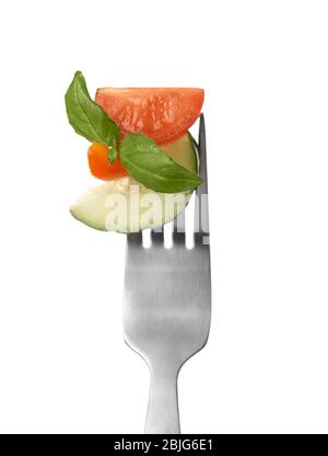 Fork with pinned snack on white background Stock Photo