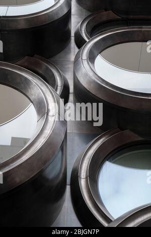 geometry of circles and ovals in metal and glass building Stock Photo