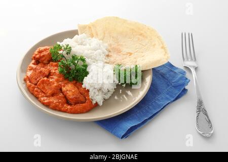 Plate with delicious Murgh Makhani on white background Stock Photo