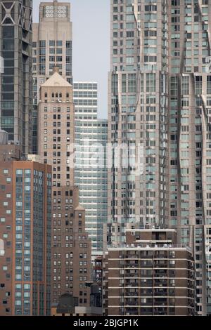 Modern grouping of New York towers arranged in vintage flat lighting Stock Photo