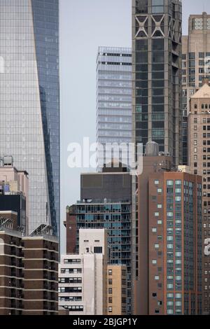 Modern grouping of New York towers arranged in vintage flat lighting Stock Photo