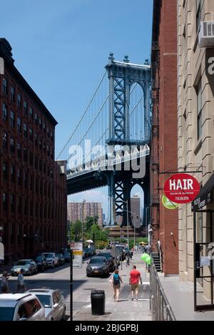 View towards Manhattan Bridge as viewed from the streets of DUMBO in Brooklyn, New York City Stock Photo