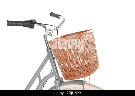Bicycle with wicker basket on white background Stock Photo