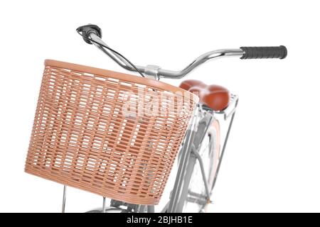 Bicycle with wicker basket on white background Stock Photo