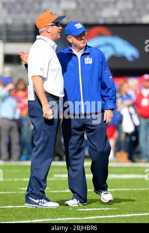 New York Giants' Eli Manning tries to get away from Denver Broncos' Robert  Ayers at MetLife Stadium in East Rutherford, New Jersey, Sunday, September  15, 2013. (Photo by Tyson Trish/The Record/MCT/Sipa USA