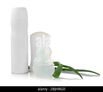 Different deodorants and aloe leaves isolated on white Stock Photo