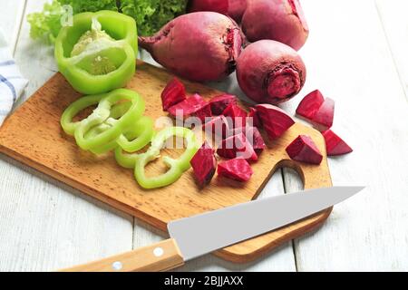 Fresh young beets and pepper on table Stock Photo