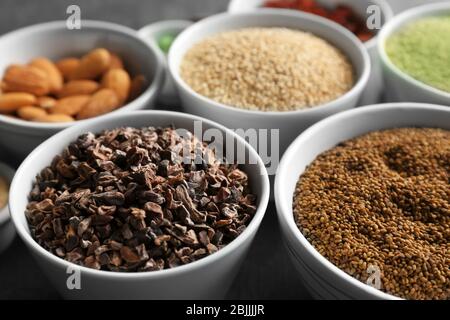 Composition with assortment of superfood products in bowls, closeup Stock Photo