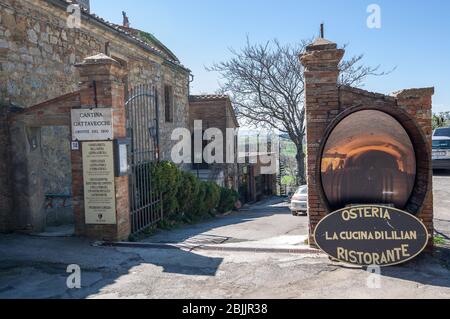 MONTEPULCIANO, ITALY - APRIL 15, 2013: Entrance in wine cellar, cantina and restaurant Cantina Gattavecchi in Montepulciano, Tuscany, Italy Stock Photo