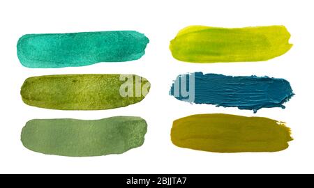 Green paint brushstrokes, isolated on white Stock Photo