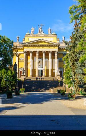 Eger, Hungary - September 20, 2013: View of the Cathedral Basilica of St. John the Apostle, with visitors, in Eger, Hungary Stock Photo