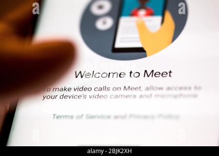Bucharest, Romania - April 30, 2020: Shallow depth of field (selective focus) and macro image with the Google Meet mobile application. Stock Photo