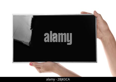 Young woman holding broken display on white background Stock Photo