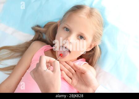 Cute girl at speech therapist's office Stock Photo