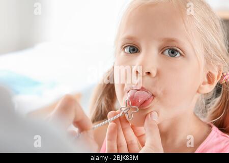 Cute girl at speech therapist's office Stock Photo