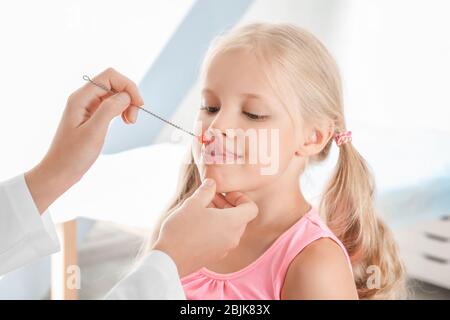 Cute girl at speech therapist's office Stock Photo