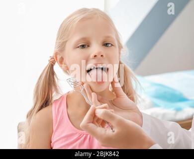 Cute girl at speech therapist's office Stock Photo