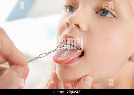 Cute girl at speech therapist's office, closeup Stock Photo