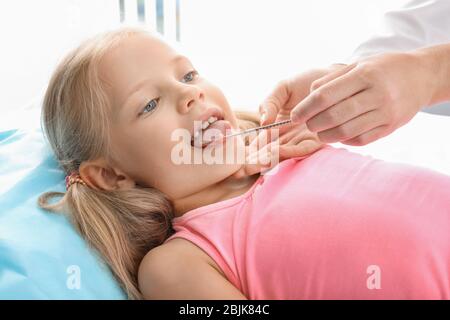 Cute girl at speech therapist's office Stock Photo