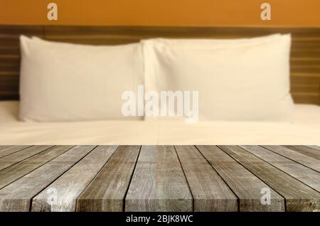 wood table top blur pillow on bedrooms for product display montage. Stock Photo