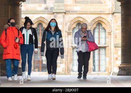 Glasgow university students wearing face masks during the coronavirus pandemic, Scotland UK Stock Photo