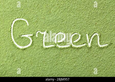 Word GREEN made from wheat grass powder Stock Photo
