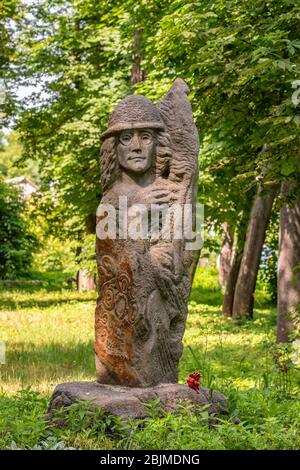 John Lennon Memorial in Mohyliv-Podilskyi city at summer, Ukraine Stock Photo